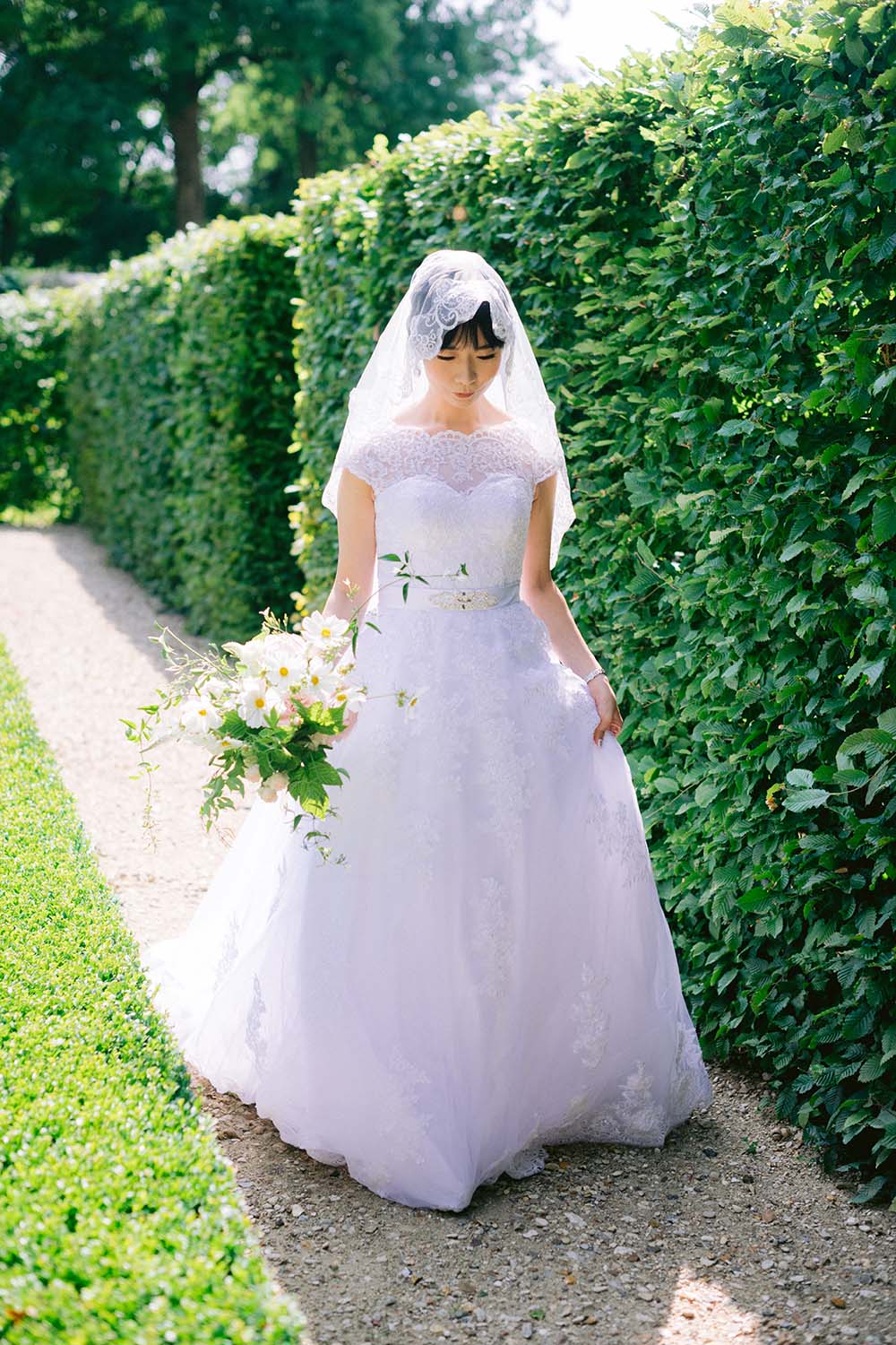 the bride is getting ready for the first look